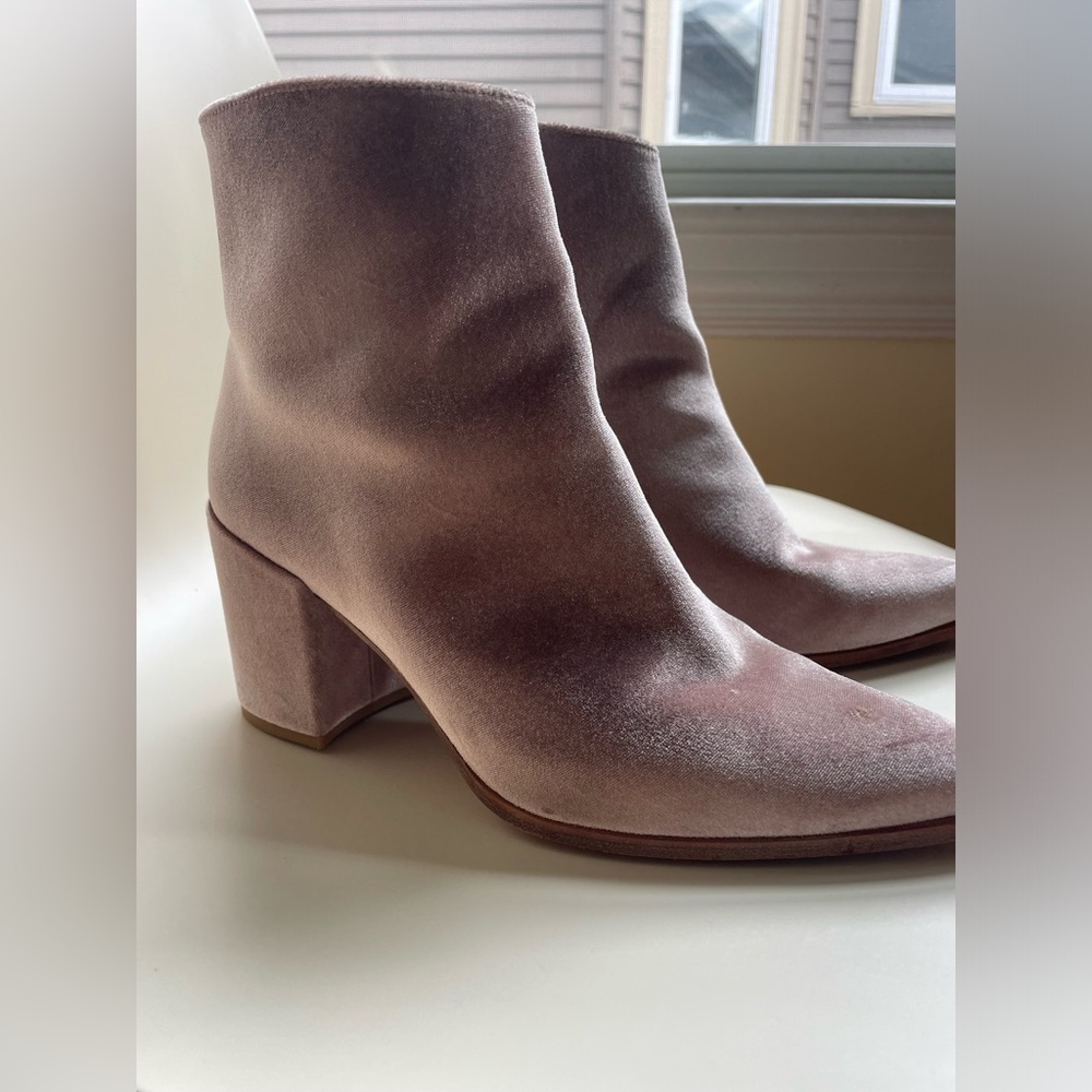 Stuart Weitzman pink velvet booties.
